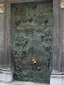 Main door sculpted by Mirsad Begić, 1996